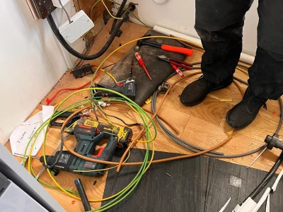 Local-Electricians-in-Hackney Experienced local electrician in Hackney working on residential electrical systems